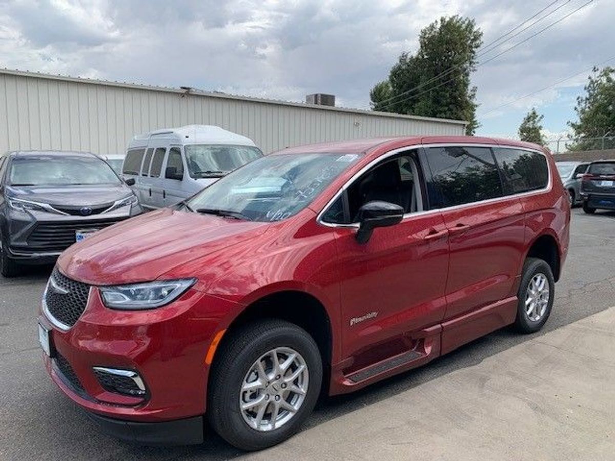 Red Chrysler Pacifica with BraunAbility Side Entry Automatic Fold Out conversion