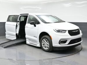 White Chrysler Pacifica with BraunAbility Side Entry Automatic Fold Out conversion