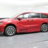 Red Honda Odyssey with BraunAbility Side Entry Automatic In Floor conversion