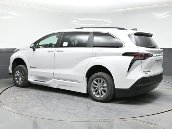 White Toyota Sienna with BraunAbility Side Entry Automatic In Floor conversion