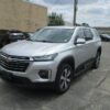 Silver Chevrolet Traverse with BraunAbility Side Entry Automatic In Floor conversion