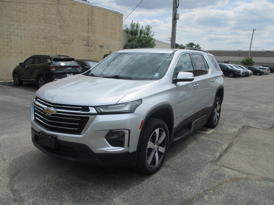 Silver Chevrolet Traverse with BraunAbility Side Entry Automatic In Floor conversion