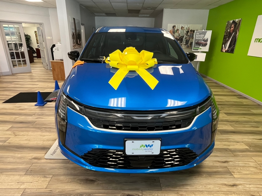 Blue Chrysler Pacifica with Driverge Side Entry Automatic Fold Out conversion