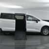 White Chrysler Voyager with BraunAbility Side Entry Manual Fold Out conversion