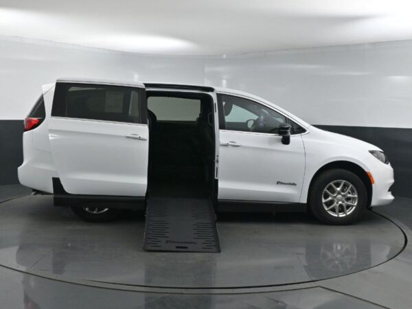 White Chrysler Voyager with BraunAbility Side Entry Manual Fold Out conversion