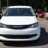 White Chrysler Voyager with BraunAbility Rear Entry Manual Fold Out conversion