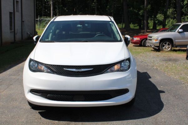 White Chrysler Voyager with BraunAbility Rear Entry Manual Fold Out conversion