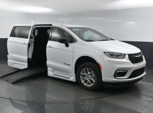 White Chrysler Pacifica with BraunAbility Side Entry Automatic Fold Out conversion