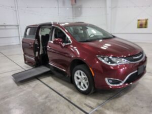 Red Chrysler Pacifica with Vantage Mobility Side Entry Automatic In Floor conversion