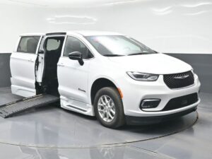 White Chrysler Pacifica with BraunAbility Side Entry Automatic Fold Out conversion