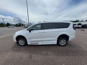 White Chrysler Pacifica with BraunAbility Side Entry Automatic Fold Out conversion