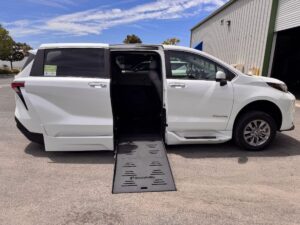 White Toyota Sienna with BraunAbility Side Entry Automatic Fold Out conversion