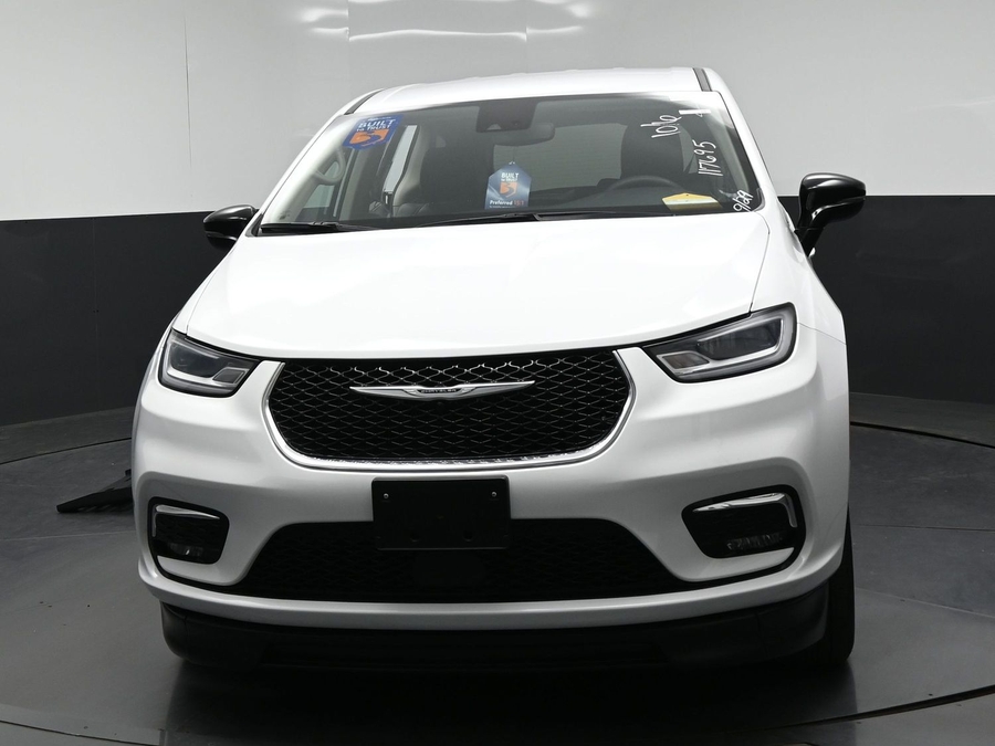 White Chrysler Pacifica with BraunAbility Side Entry Automatic Fold Out conversion