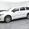 White Chrysler Voyager with BraunAbility Rear Entry Manual Fold Out conversion
