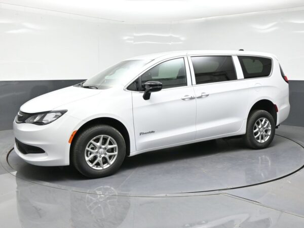 White Chrysler Voyager with BraunAbility Rear Entry Manual Fold Out conversion