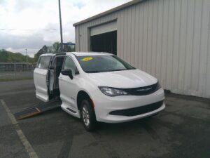 White Chrysler Voyager with Driverge Side Entry Automatic Fold Out conversion