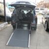 Blue Toyota Sienna with Driverge Rear Entry Manual Fold Out conversion