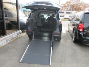 Blue Toyota Sienna with Driverge Rear Entry Manual Fold Out conversion
