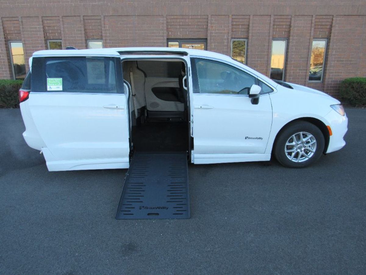 White Chrysler Voyager with BraunAbility Side Entry Automatic Fold Out conversion