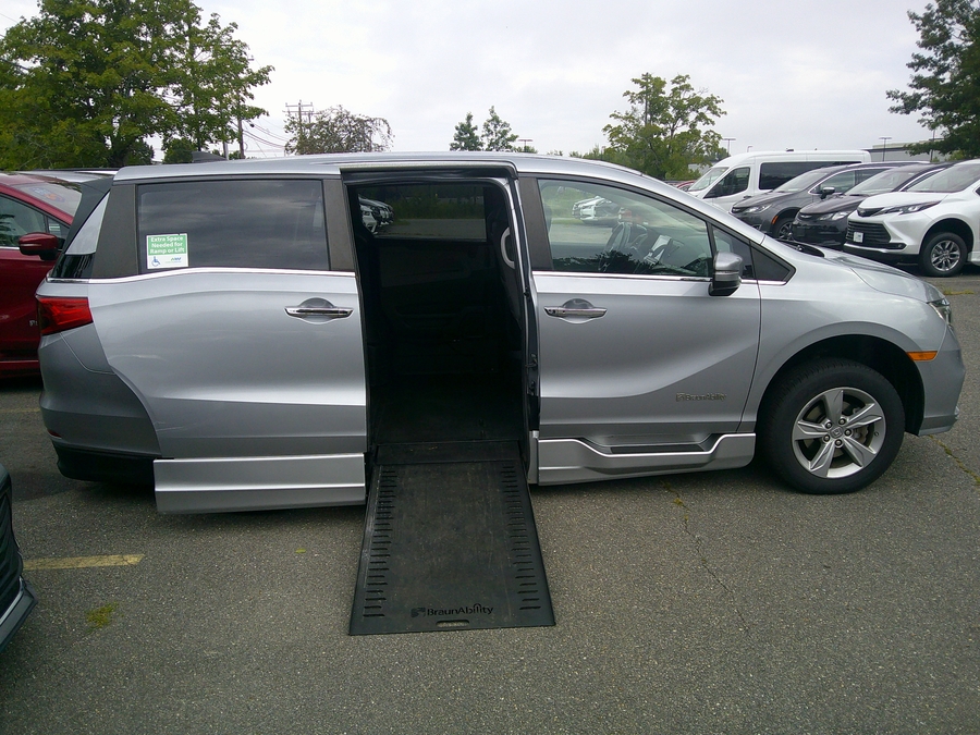 Silver Honda Odyssey with BraunAbility Side Entry Automatic In Floor conversion