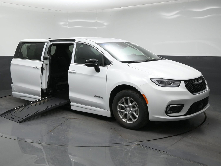 White Chrysler Pacifica with BraunAbility Side Entry Automatic Fold Out conversion