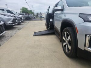 Silver Chevrolet Traverse with BraunAbility Side Entry Automatic In Floor conversion