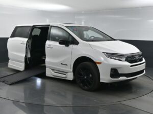 White Honda Odyssey with BraunAbility Side Entry Automatic In Floor conversion