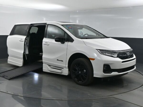 White Honda Odyssey with BraunAbility Side Entry Automatic In Floor conversion