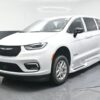 White Chrysler Pacifica with BraunAbility Side Entry Automatic Fold Out conversion