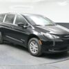 Black Chrysler Voyager with BraunAbility Rear Entry Manual Fold Out conversion