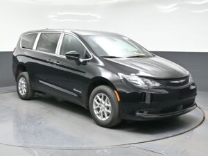 Black Chrysler Voyager with BraunAbility Rear Entry Manual Fold Out conversion