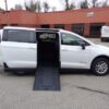White Chrysler Voyager with BraunAbility Side Entry Manual Fold Out conversion