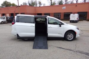 White Chrysler Voyager with BraunAbility Side Entry Manual Fold Out conversion