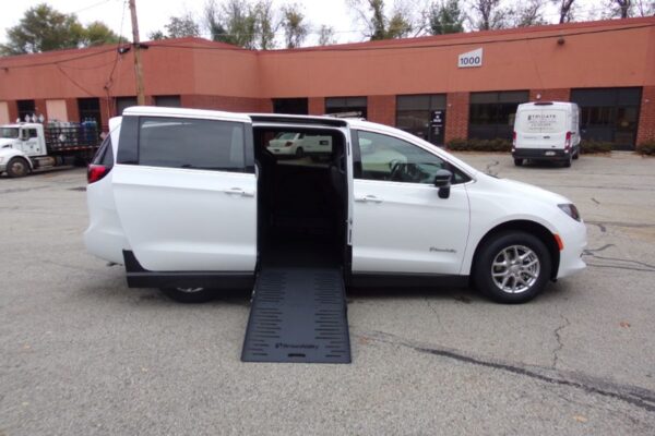White Chrysler Voyager with BraunAbility Side Entry Manual Fold Out conversion