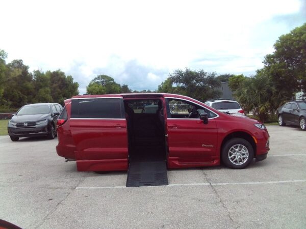 Red Chrysler Pacifica with BraunAbility Side Entry Automatic Fold Out conversion