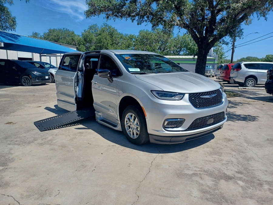 White Chrysler Voyager with BraunAbility Side Entry Automatic In Floor conversion