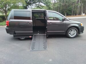 Grey Dodge Grand Caravan with Adaptive Vans Side Entry Automatic Fold Out conversion