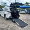 White Toyota Sienna with Driverge Rear Entry Manual Fold Out conversion