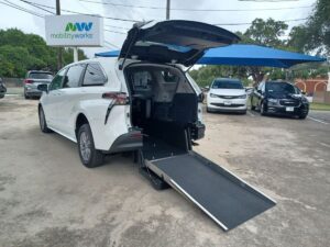 White Toyota Sienna with Driverge Rear Entry Manual Fold Out conversion