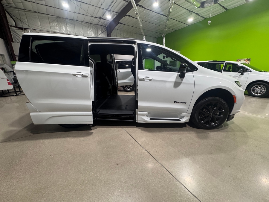 White Chrysler Pacifica with BraunAbility Side Entry Automatic In Floor conversion