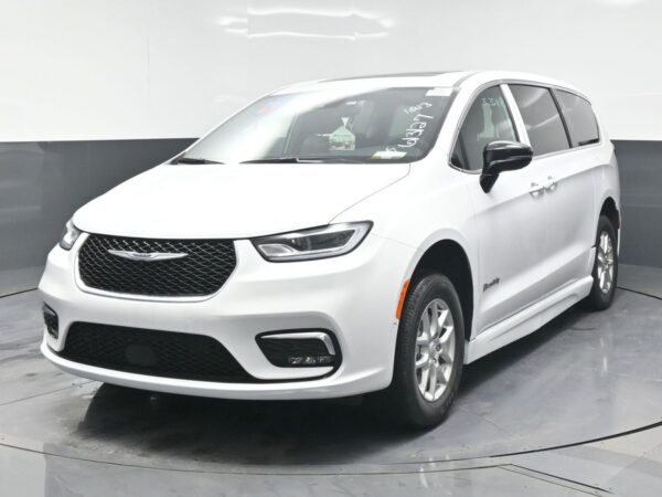 White Chrysler Pacifica with BraunAbility Side Entry Automatic Fold Out conversion