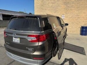 Grey Honda Odyssey with BraunAbility Side Entry Automatic In Floor conversion