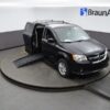 Black Dodge Grand Caravan with BraunAbility Side Entry Automatic Fold Out conversion