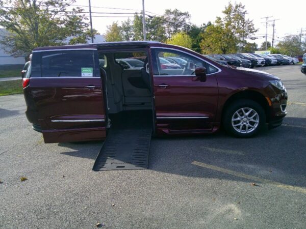 Red Chrysler Pacifica with BraunAbility Side Entry Automatic Fold Out conversion