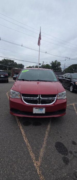 Red Dodge Grand Caravan with BraunAbility Side Entry Manual Fold Out conversion