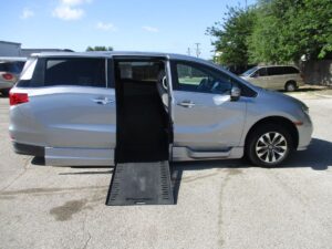 Silver Honda Odyssey with BraunAbility Side Entry Automatic In Floor conversion