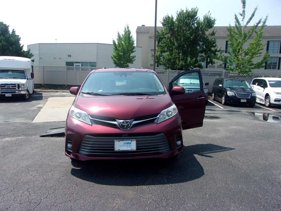 Red Toyota Sienna with BraunAbility Side Entry Automatic In Floor conversion