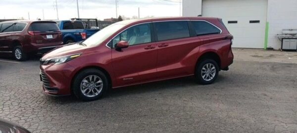 Red Toyota Sienna with Driverge Rear Entry Manual Fold Out conversion