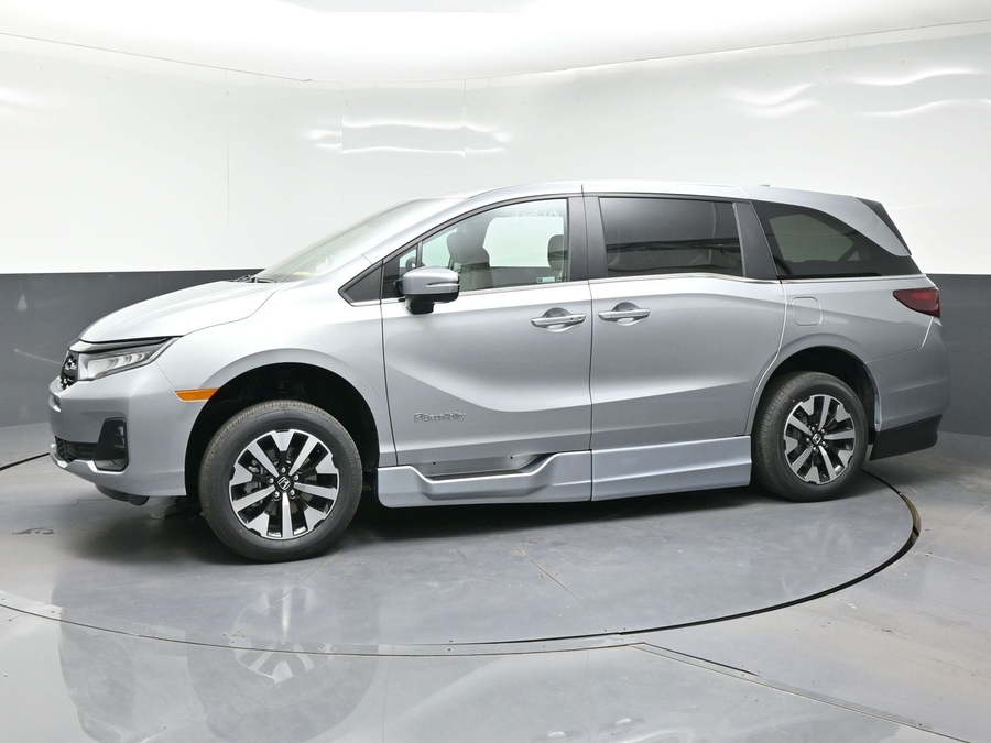 Silver Honda Odyssey with BraunAbility Side Entry Automatic In Floor conversion