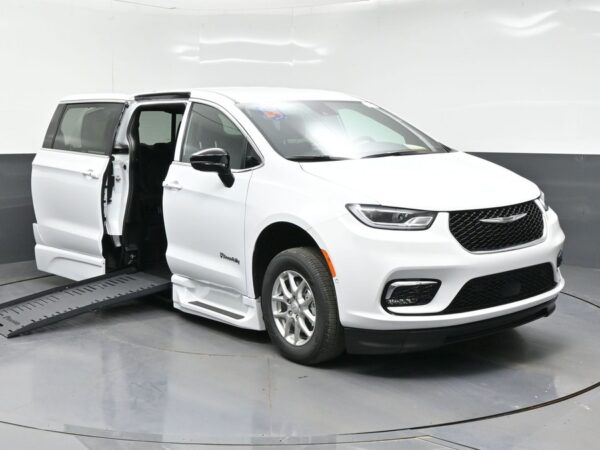 White Chrysler Pacifica with BraunAbility Side Entry Automatic Fold Out conversion